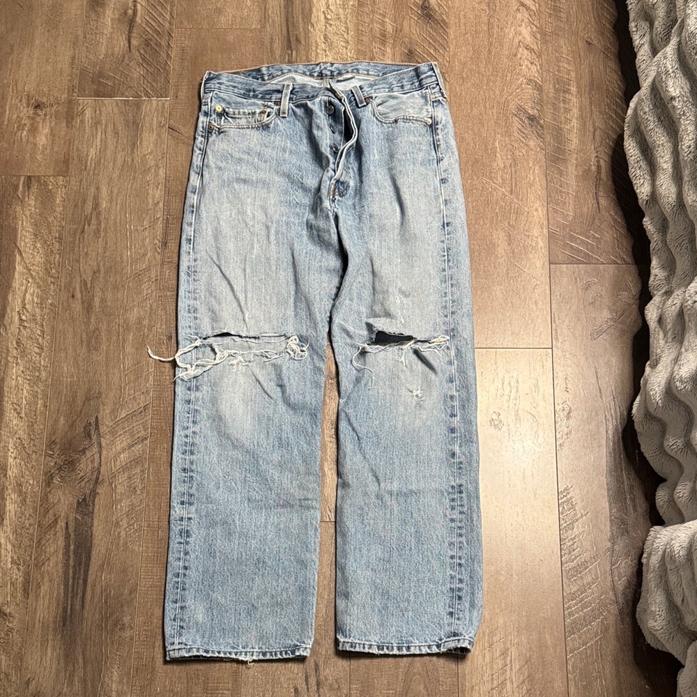 Levi's Light Blue Straight Jeans with Distressed Details